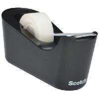 Stolní odvíječ lepicí pásky Scotch C18, 19 mm, černá (obrázek pro) Stolní odvíječ lepicí pásky Scotch C18, 19 mm, černá
